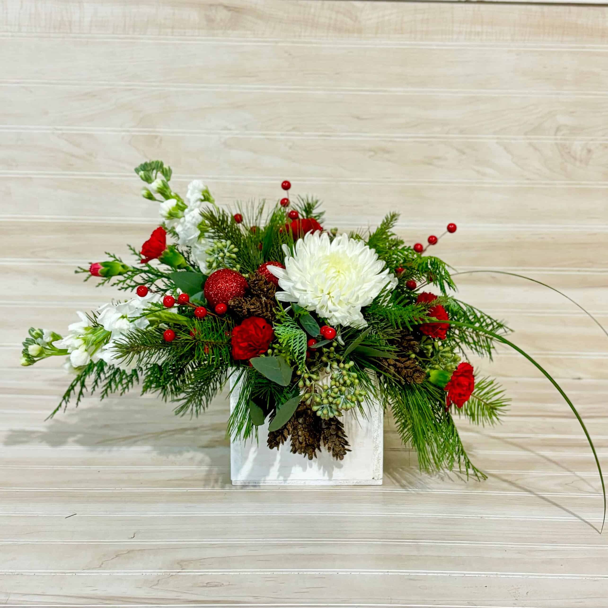 Christmas Flower Arrangement in White Container